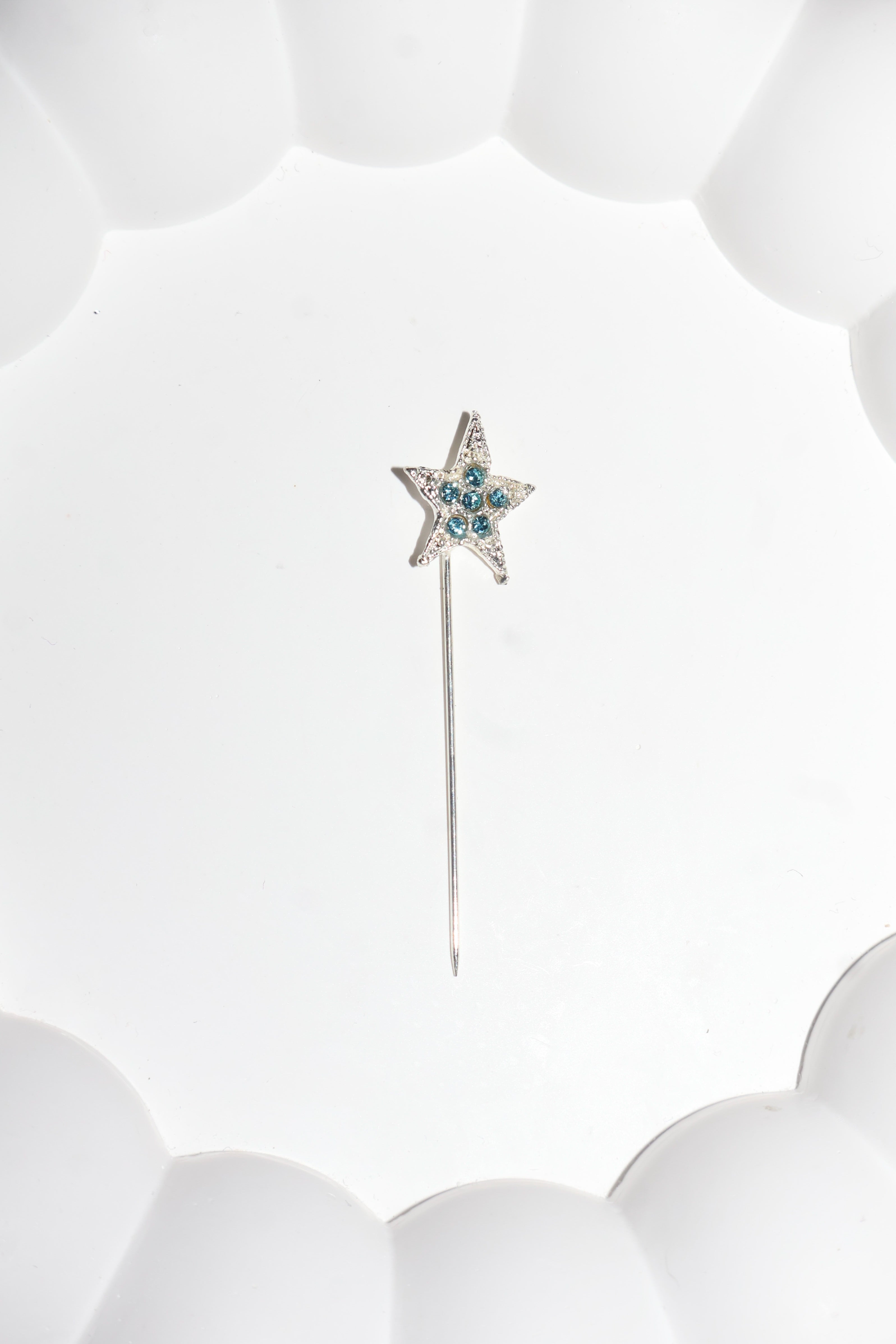 Süslü iğne mavi taşlı yıldız