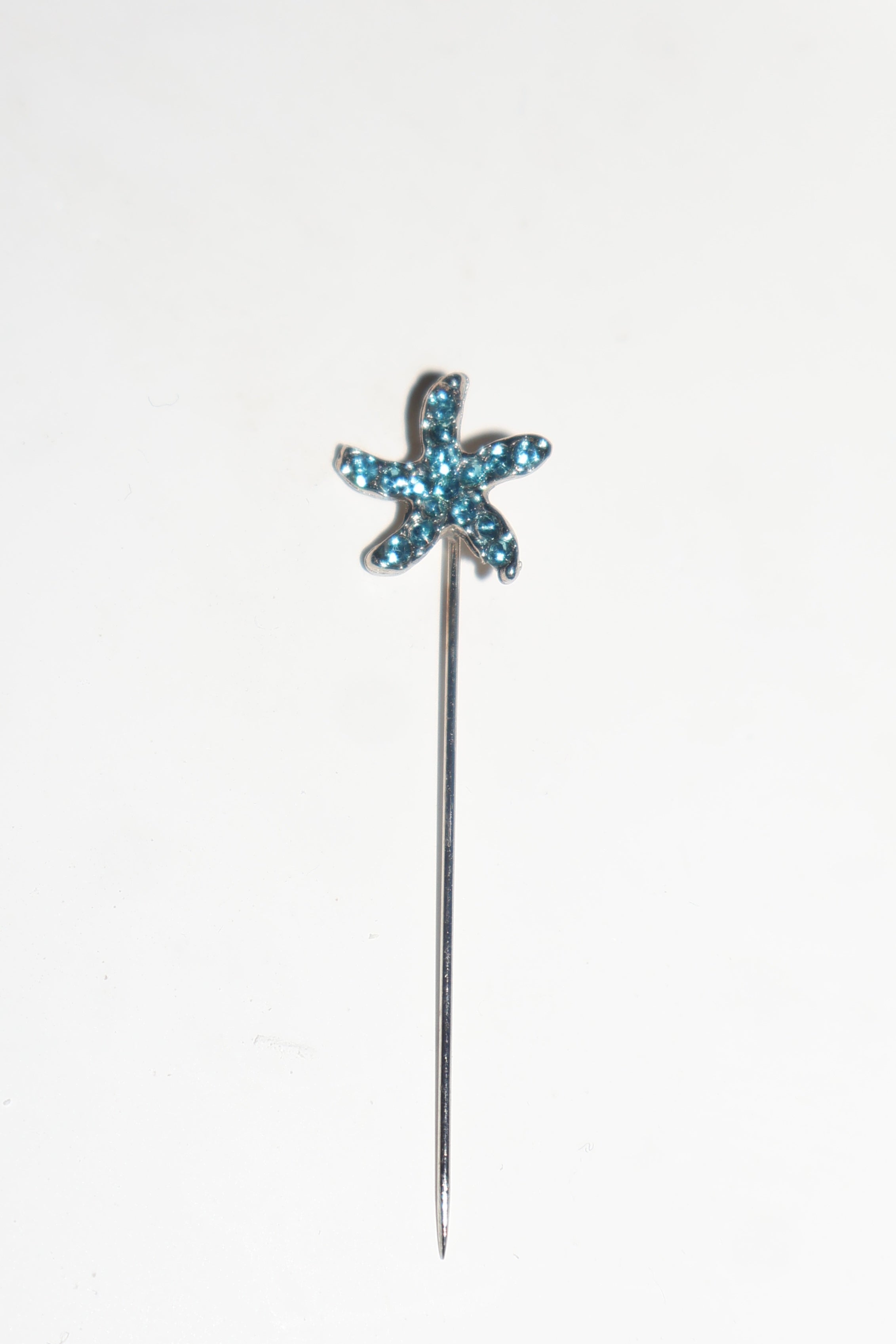 Süslü iğne mavi yıldız